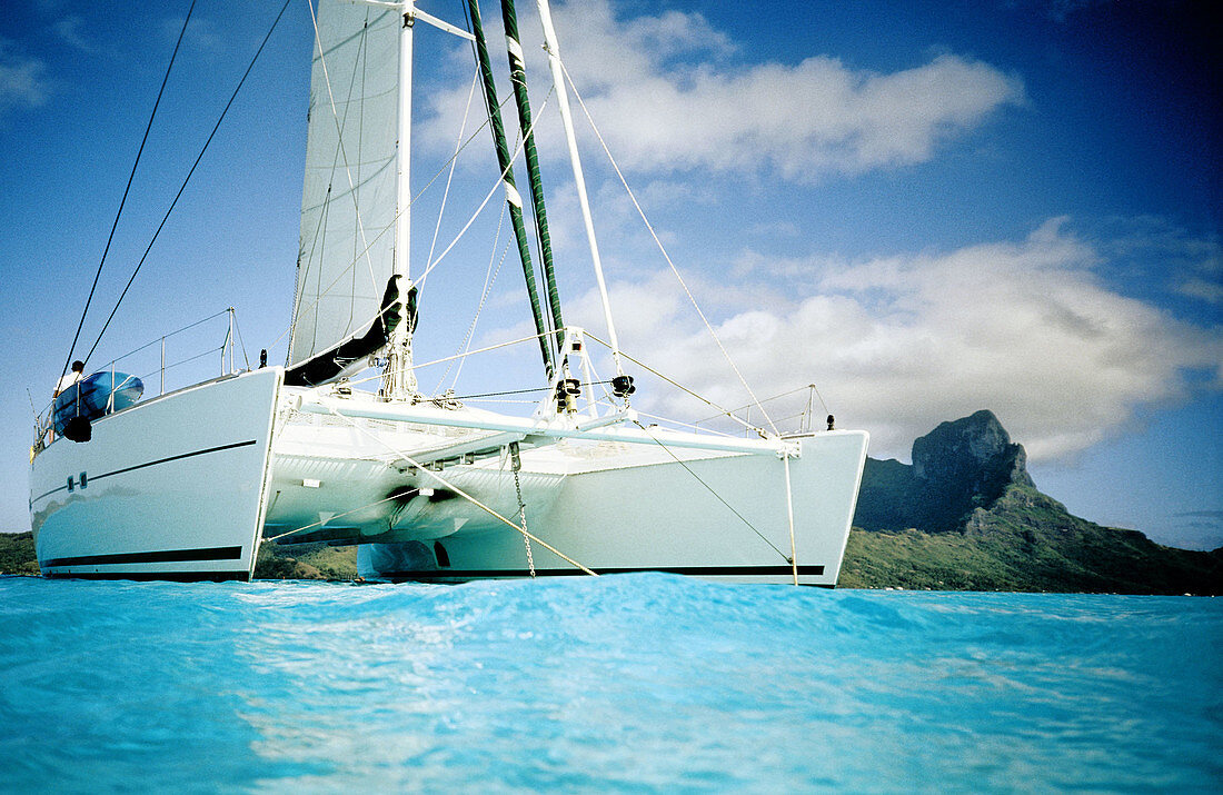 Sailing catamaran moored in the lagoon.Bora-Bora in the Leeward islands. Society archipelago. French Polynesia