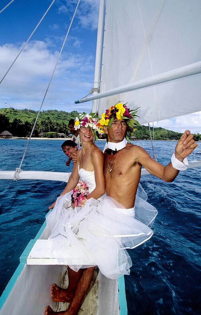 Wedding celebrated on an outrigger. Bora-Bora in the Leeward islands. Society archipelago. French Polynesia (model released)