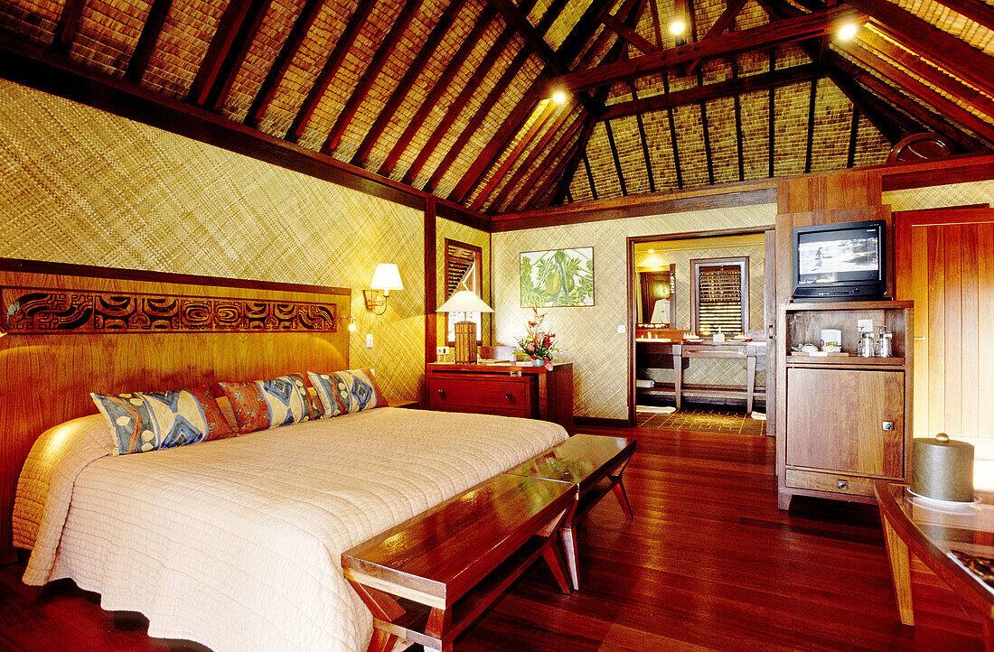 Interior of a luxury bungalow hotel built on stilts over the lagoon. Bora-Bora in the Leeward islands. Society archipelago. French Polynesia