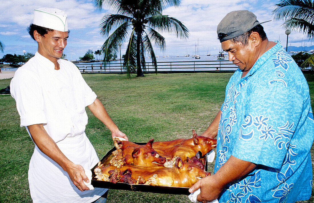 Roasted piglets for the sunday hi-maa (festival lunch cooked in the ground with hot stones). Hotel Maeva in Punaauia. Tahiti island . indward islands. Society archipelago. French Polynesia