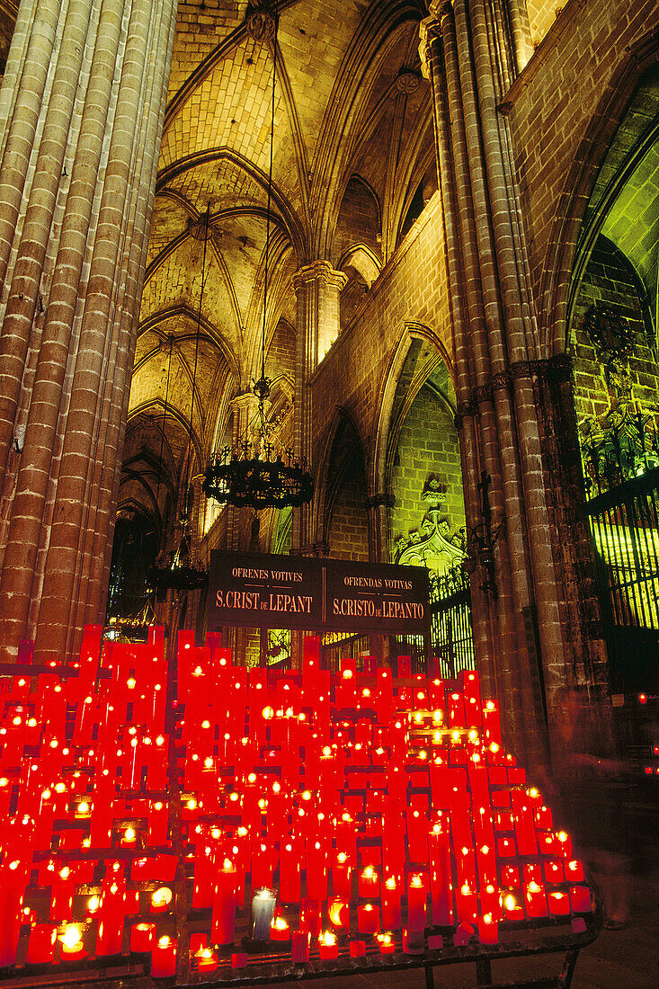 Lit candles in the cathedral. Barcelona. Spain