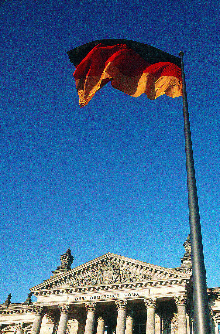 German flag in front of Reichstag. Berlin. Germany