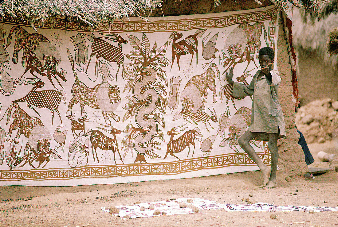 Local woven textiles exposed to visitors for sale in a village near Korrogho. Senufo Country. North Ivory Coast