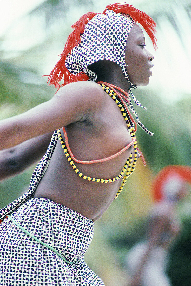 Young woman dancing for tourist in the Teranga Hotel. Casamance. Senegal