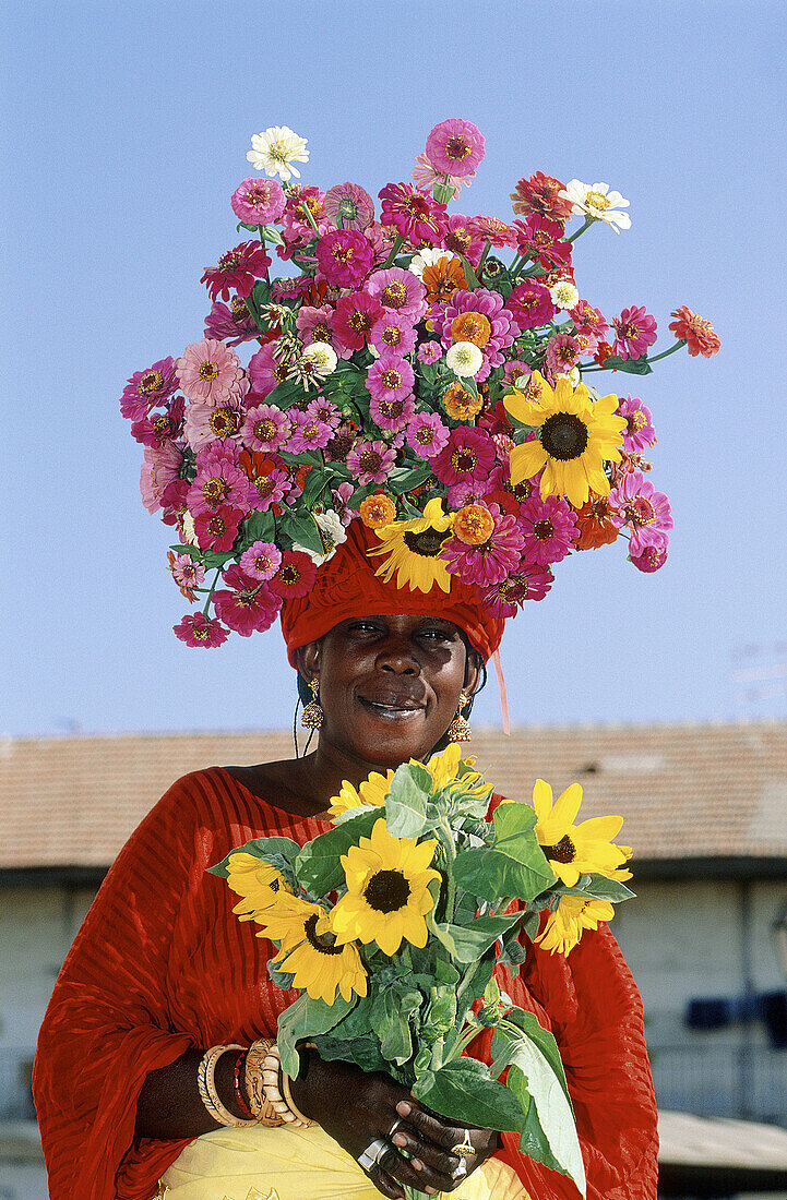 Woman selling flowers in Kermel Market in Dakar. Senegal