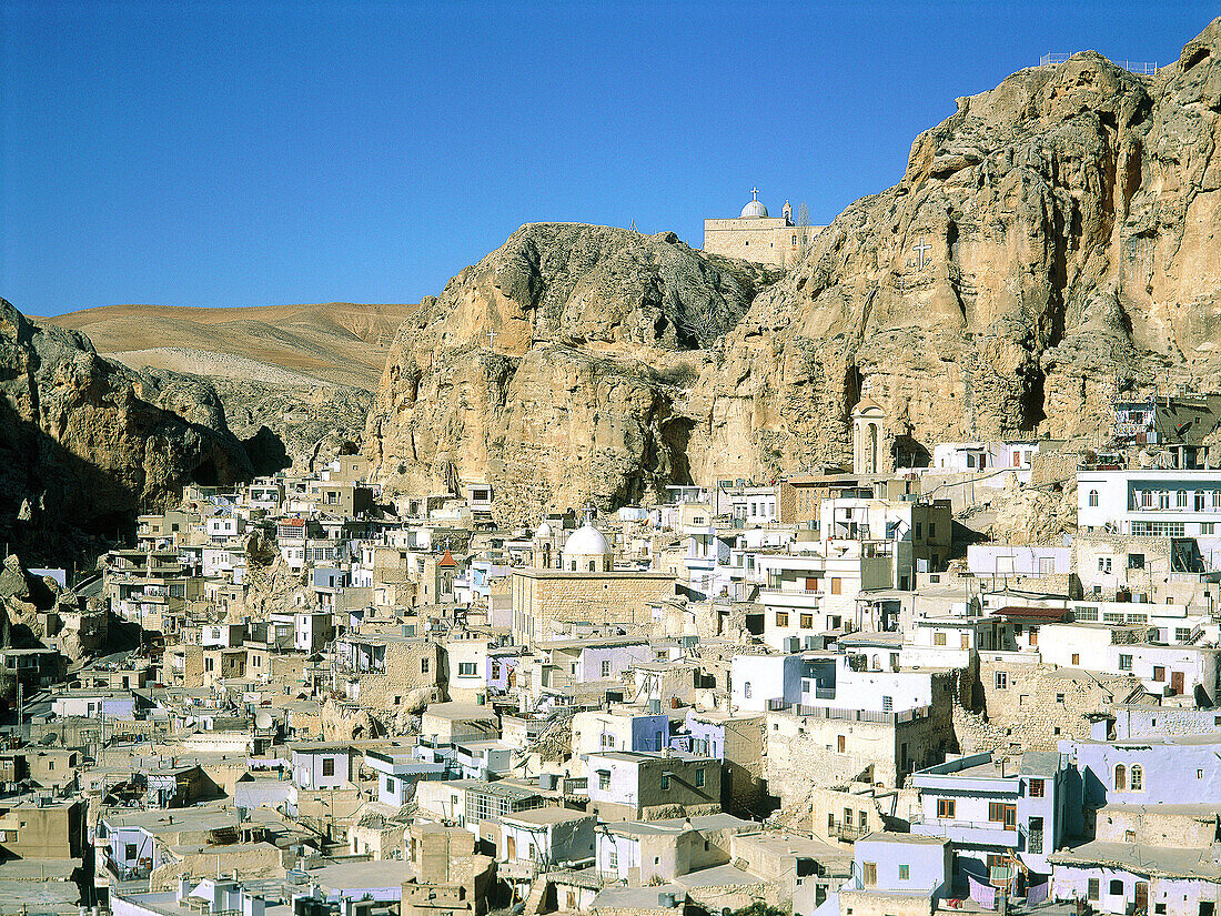 Maalula village with the Catholic monastery of Mar Sarkis (St. Sergius) on top of hill. Syria