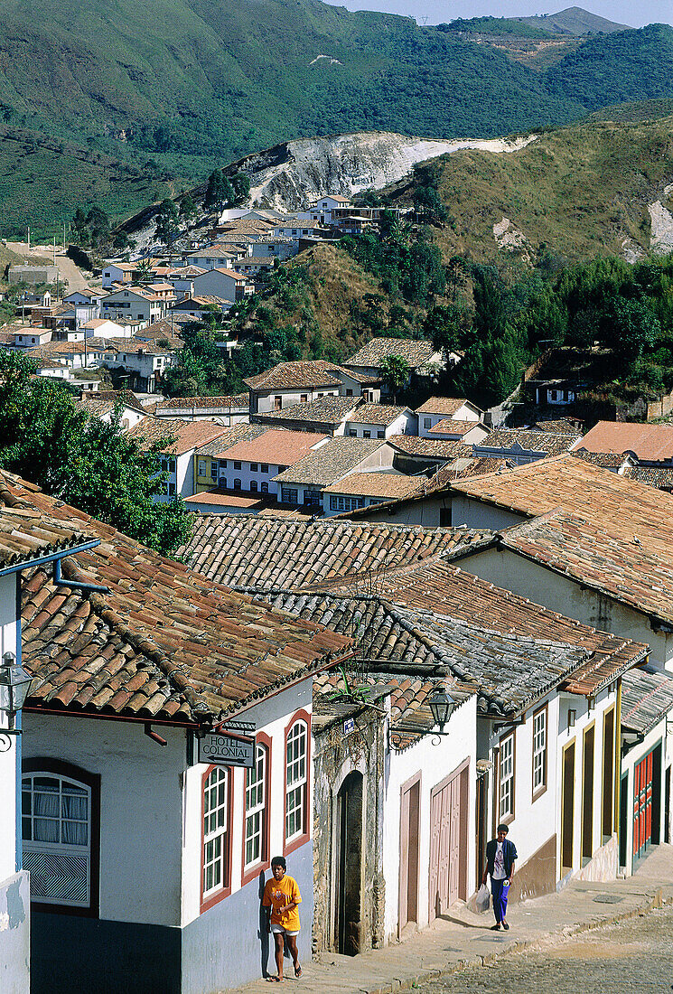 City and sloppy street from top of a hill. Historic city of Ouro Preto. Minas Gerais. Brazil