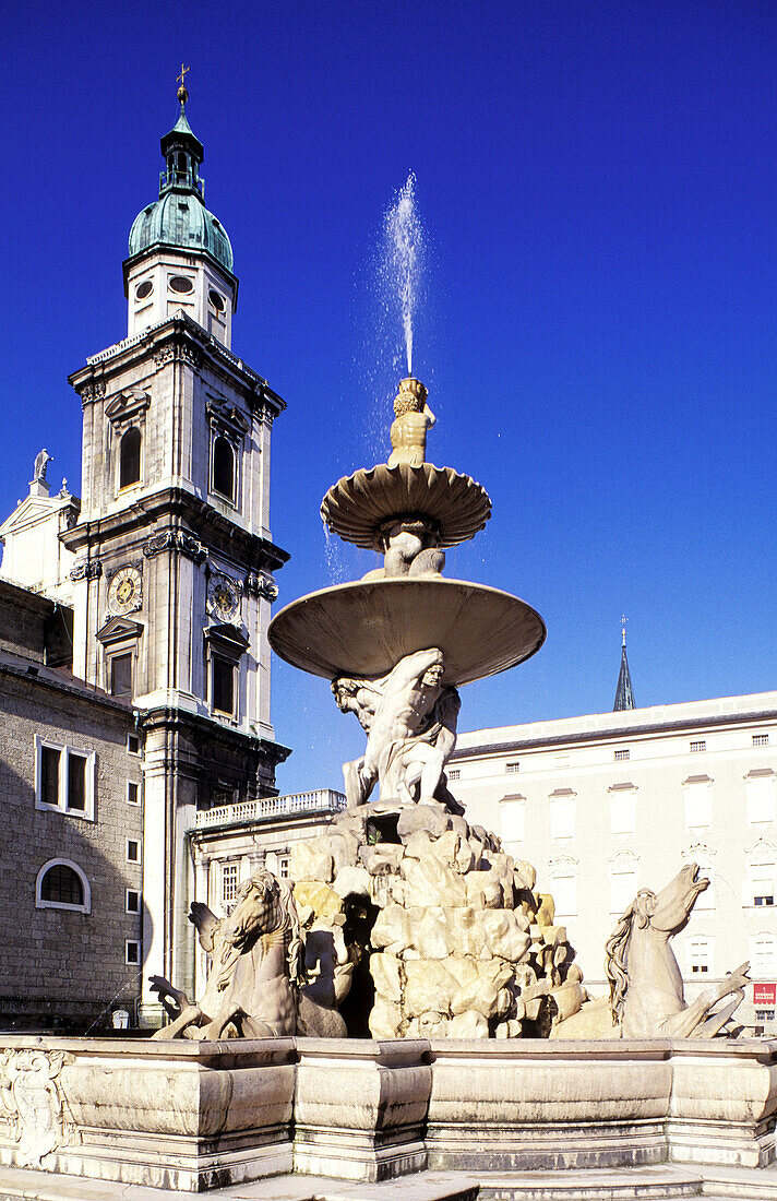 Cathedrale and fountain. Residenzplatz. Salzburg. Austria