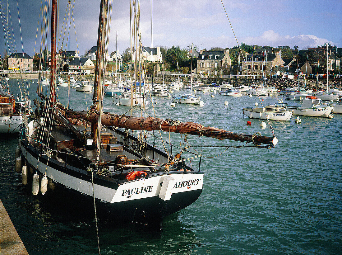Old and modern boats moored in the harbour. Pleneuf. Cotes d Armor. Brittany. France