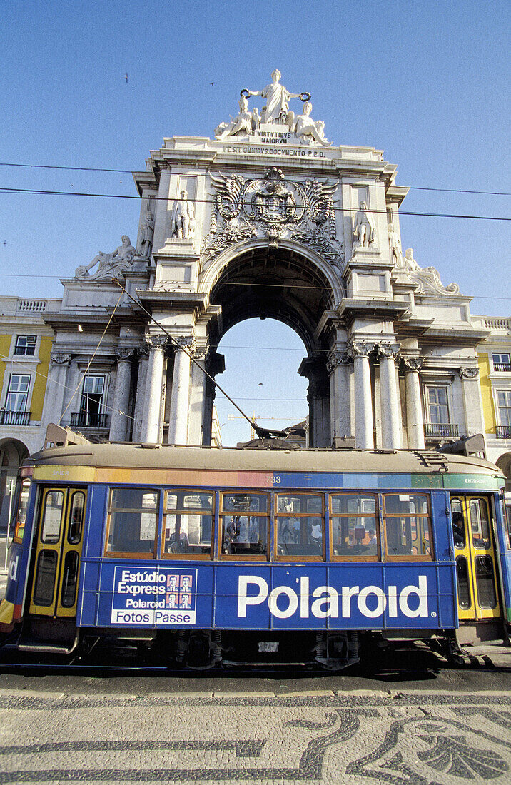 Local Tramway Electrico passing by Praça do Comercio. Lisbon. Portugal