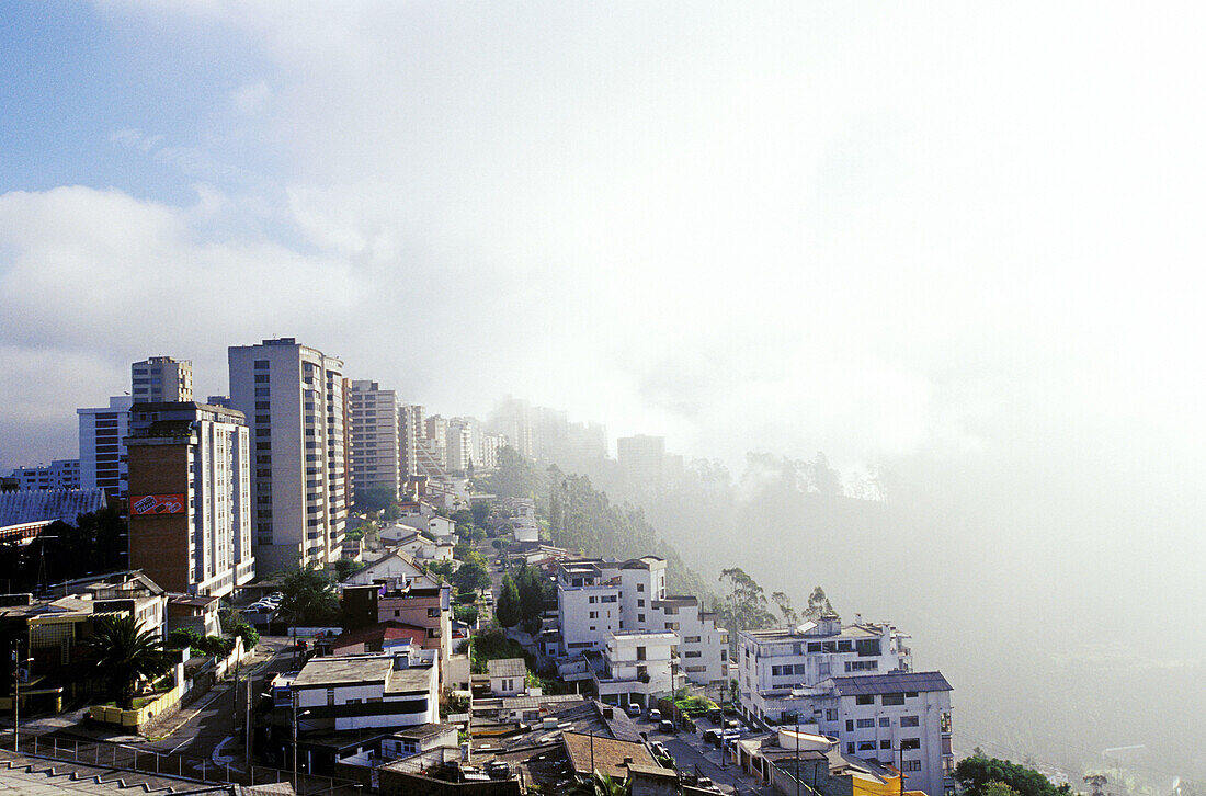 The new town in a misty day from Hotel Quito terrace. Quito. Ecuador