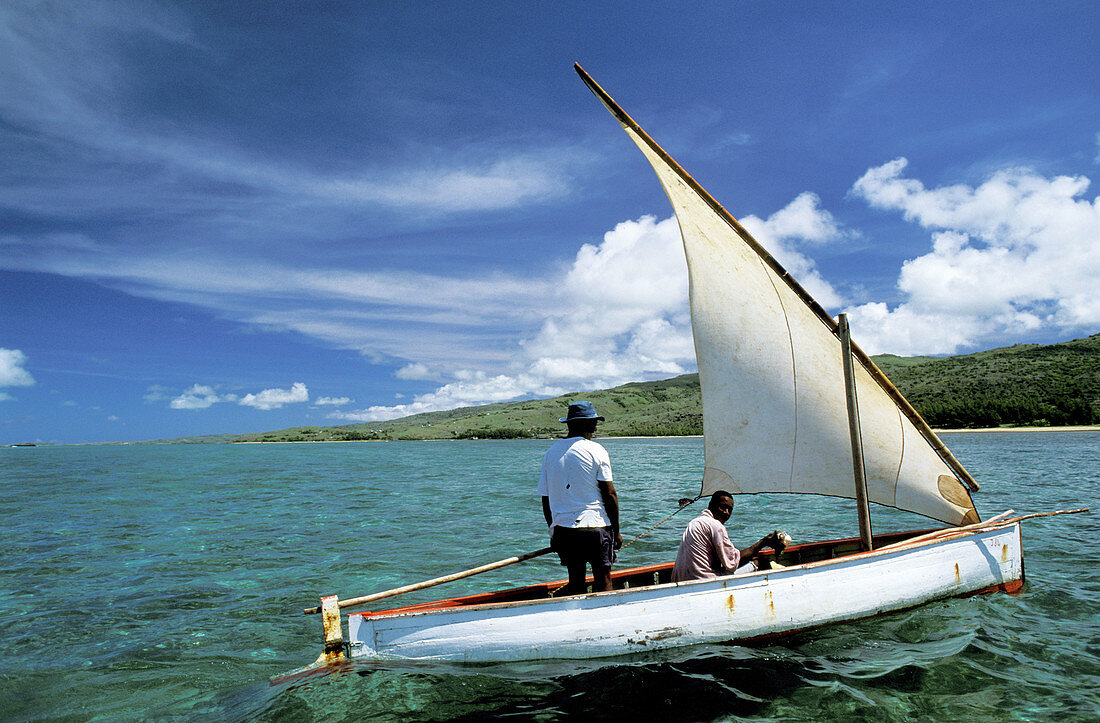 Traditional team fishing a la Senne (large seine net) in the lagoon involving many small fishing boats. Rodrigues Island. Mauritius