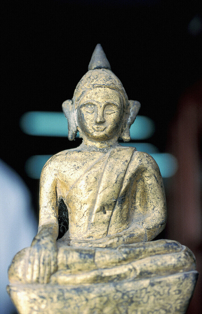 Antique bronze Buddha statuette for sale. Chatuchak Sunday Market. Bangkok. Thailand