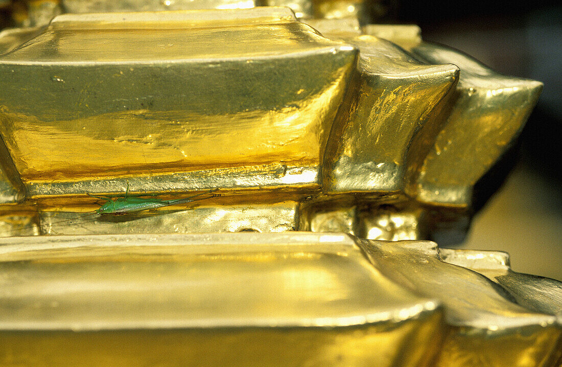 Close up on a golden frieze. Grand Palace. Wat Phra Keo (Emerald Buddha Temple). Bangkok. Thailand