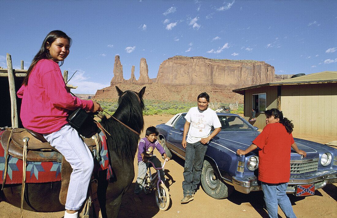 Navajo family at Monument Valley. Utah. USA