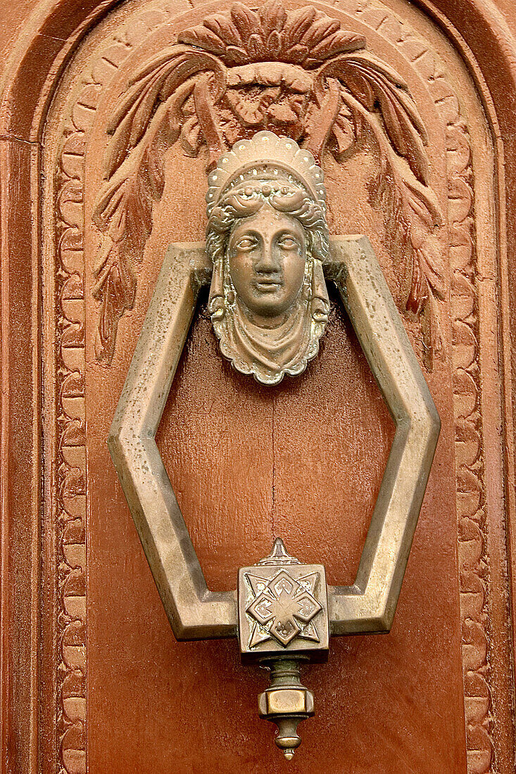 Modernist door knocker in the Reina Victoria district at Melilla. Spain.