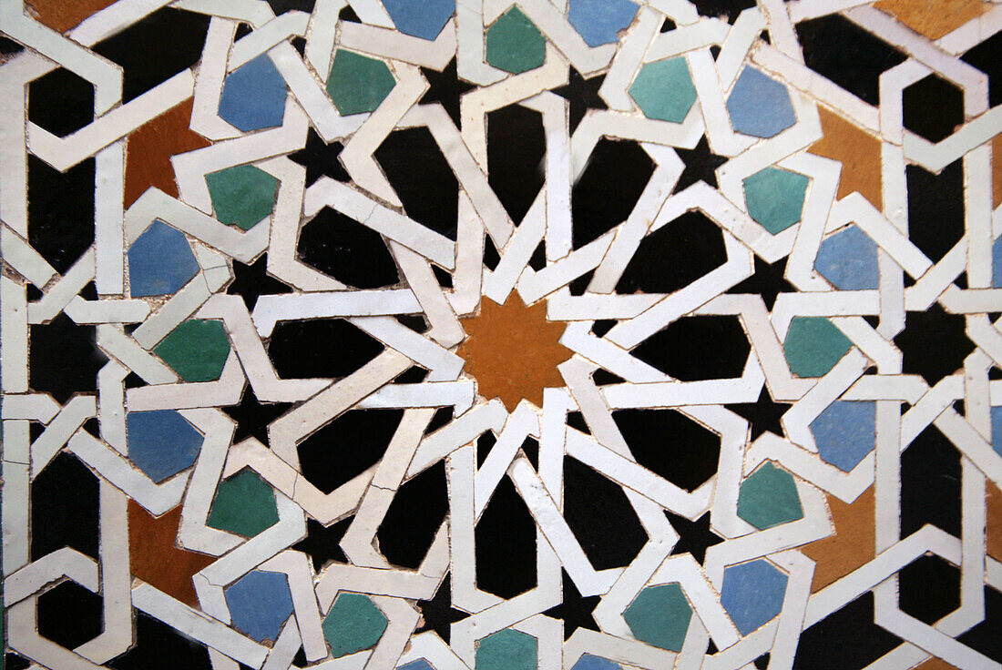 Zellige (ceramic tiles) at the Medersa Attarine. Fes. Morocco.