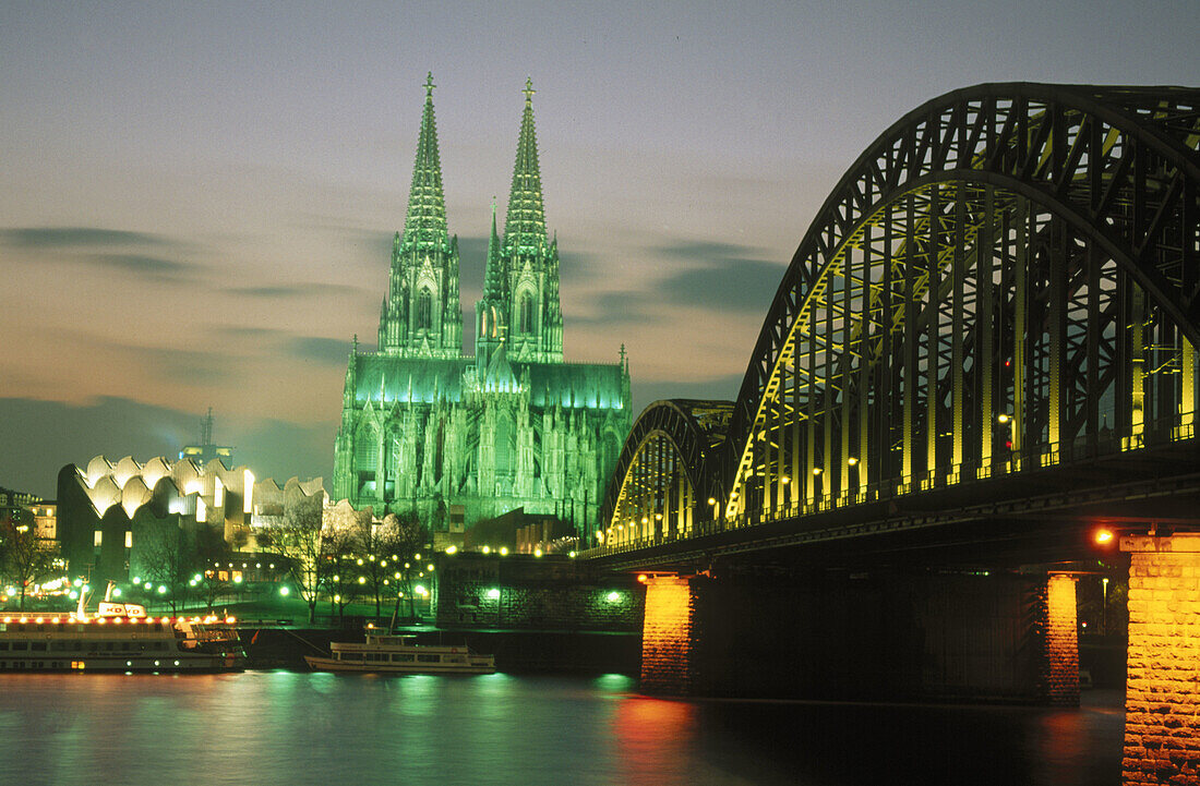 Cathedral and Hohenzollern Bridge at night. Cologne. Germany