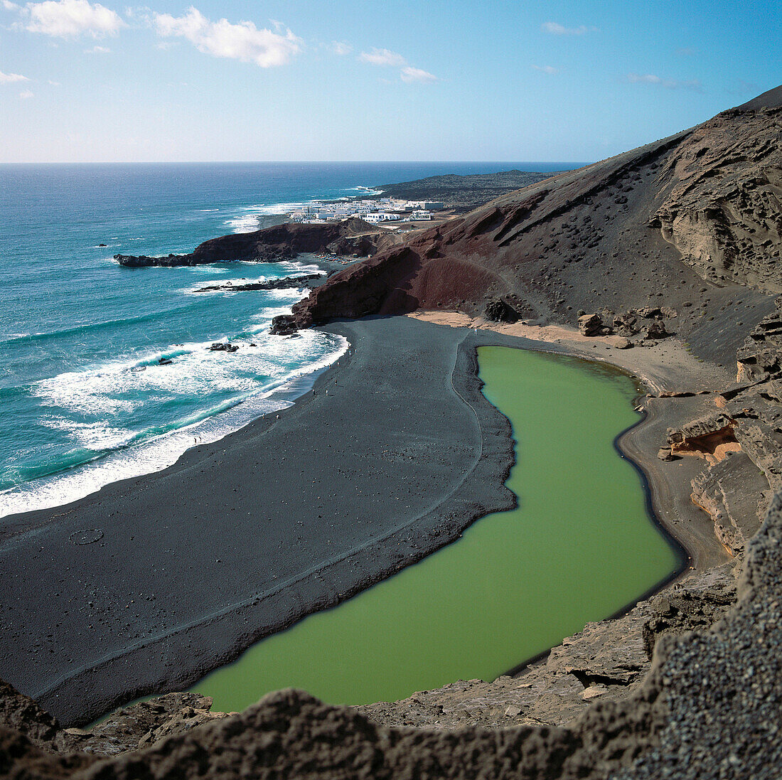 El Golfo green Lagoon. Volcanic beaches. Parque Nacional de Timanfaya. Lanzarote. Canary Islands. Spain