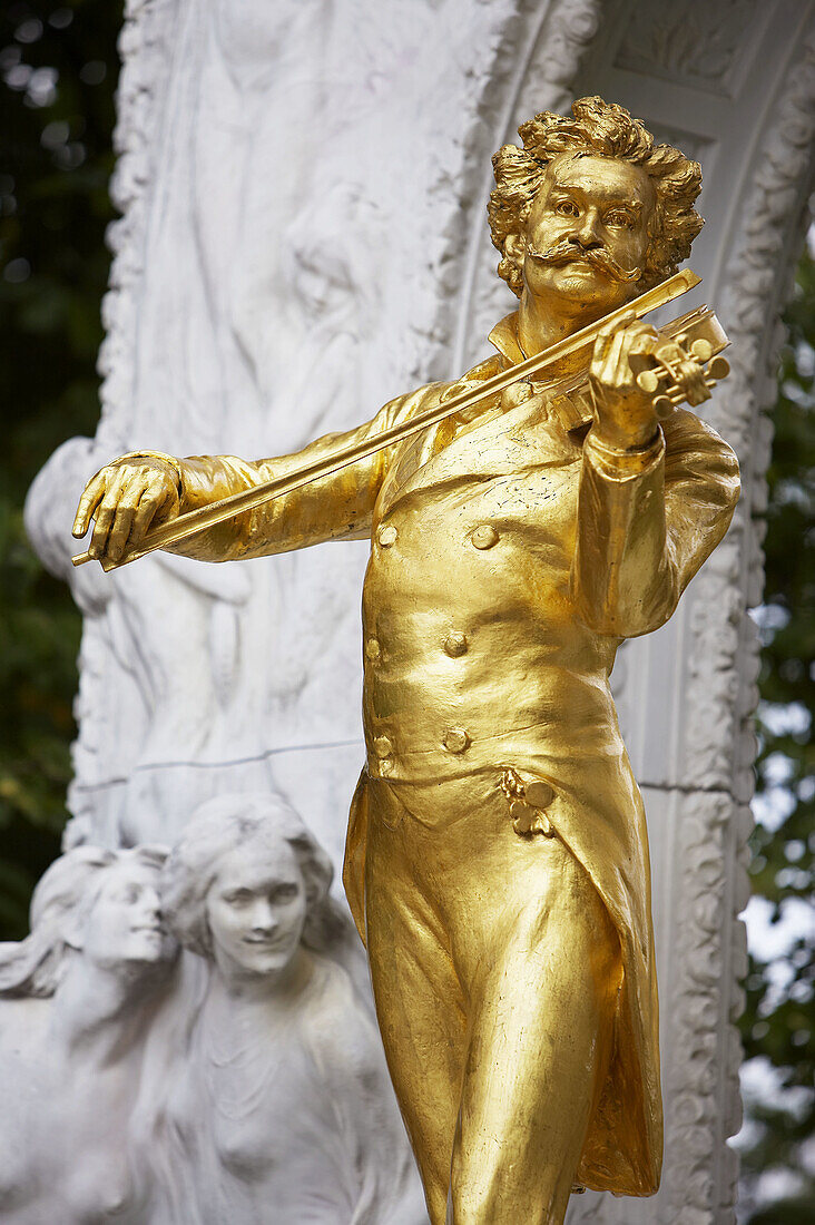 Gilded bronze monument of Johann Strauss II in Stadtpark, Vienna. Austria