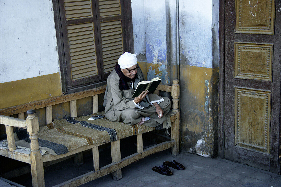 Old man reading the Qur an, Esna. Egypt