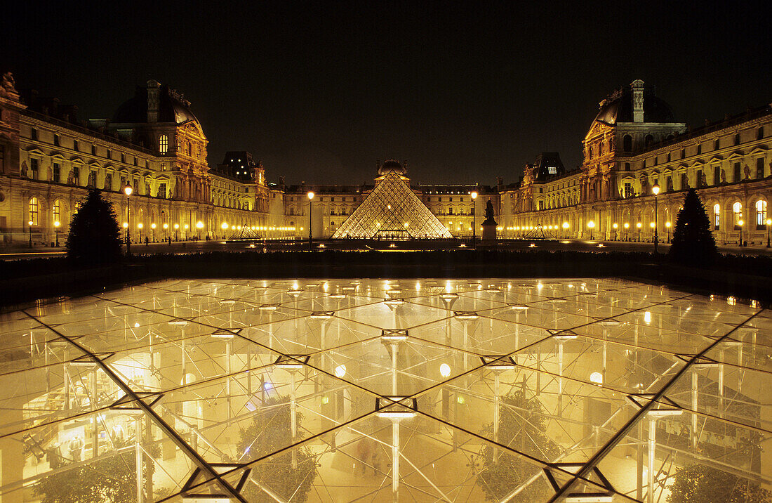 The Louvre, Napoleon court and Glass Pyramid built by IM Pei. Paris. France.