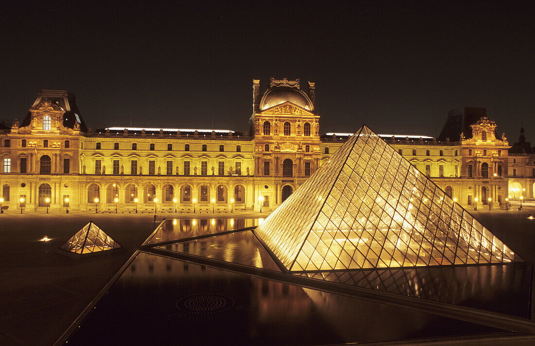 The Louvre, Napoleon court and Glass Pyramid built by IM Pei. Paris. France.