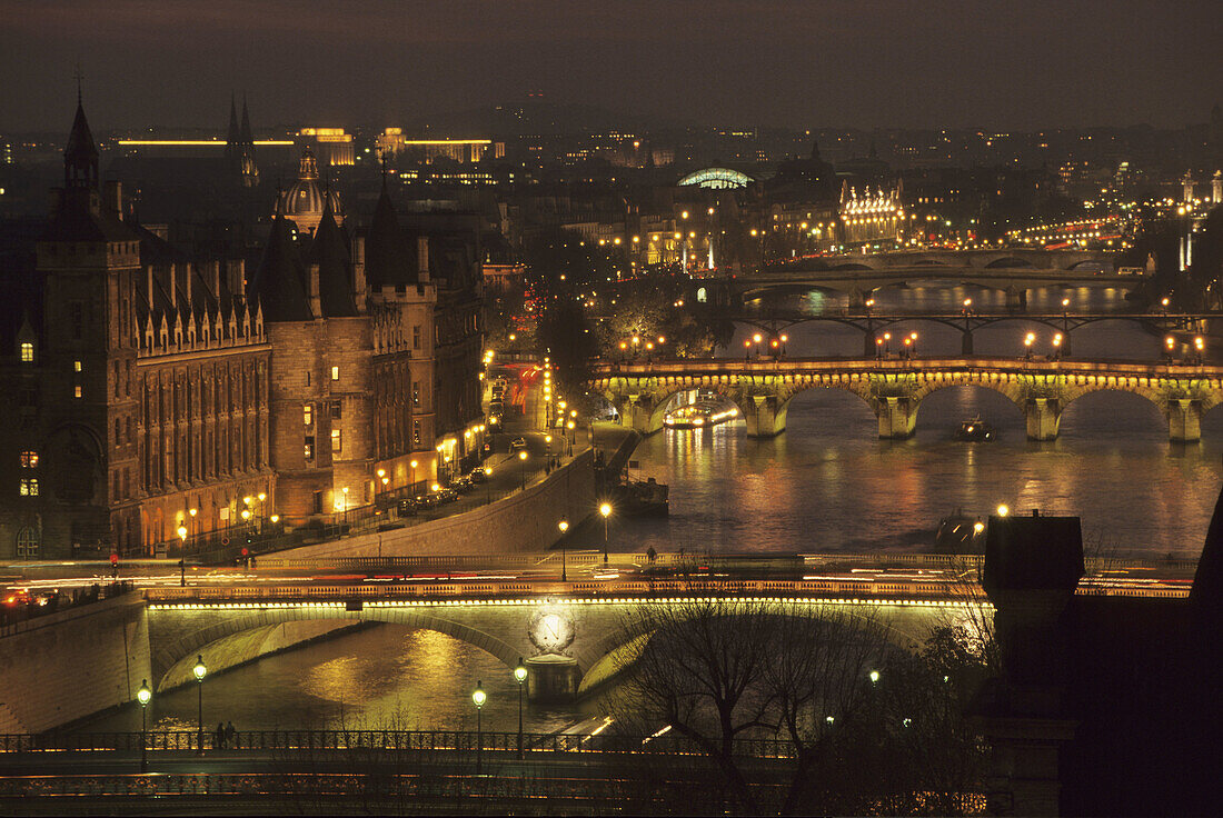 River Seine. The Concergierie. Pont au Change and Pont Neuf bridges. Paris. France.