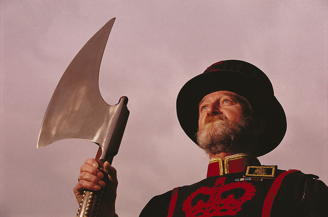 Yeoman warder with ceremonial axe. Tower of London. England