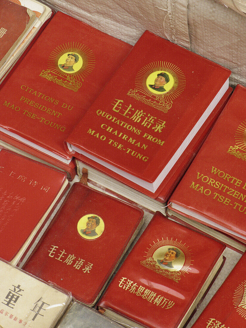 Mao Ze Dong s little red books at antiques market. Beijing, China