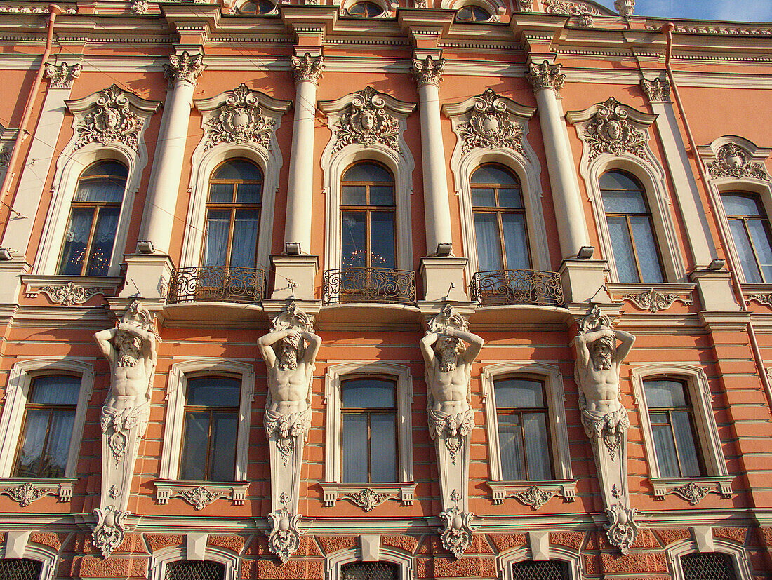 Beloselski-Belozerski palace, home to the city s Municipal Cultural Center, exterior of Italian Renaissance & baroque red sandstone, white trim European building facade on Nevsky Prospect. St. Petersburg, Russia