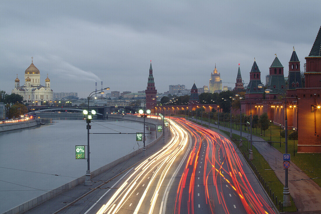 Moscow, Russia, Kremlevskaya Nab, Kremlin Walls, Neva River, at twilight, with traffic, rush hour, car light streaks.