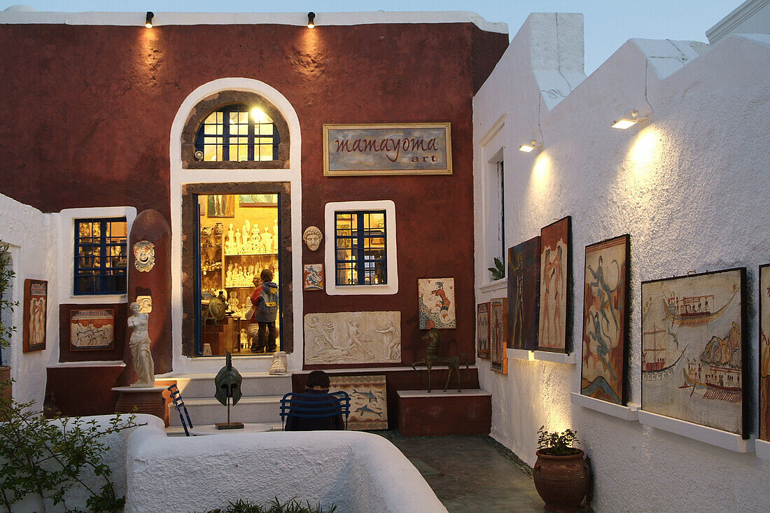 Santorini, Greece, an art shop at twilight in the village of Oia.