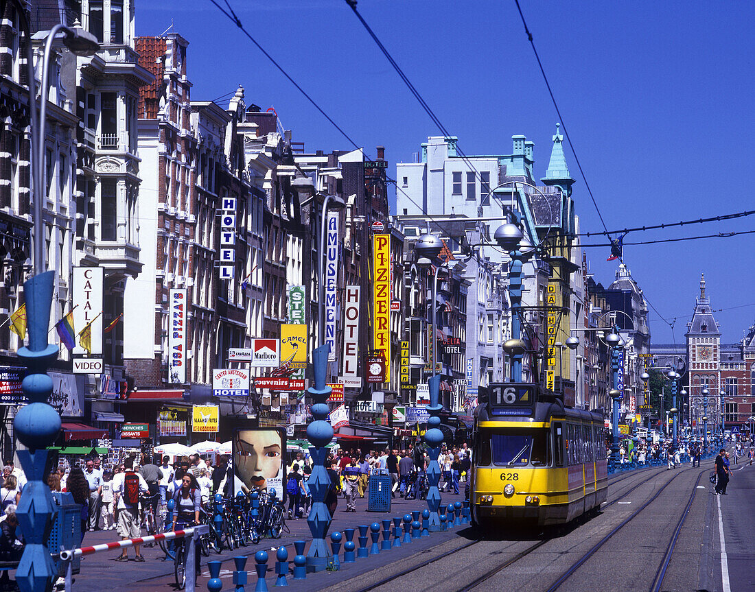 Street scene, trams, Dam rak, Amsterdam, holland.