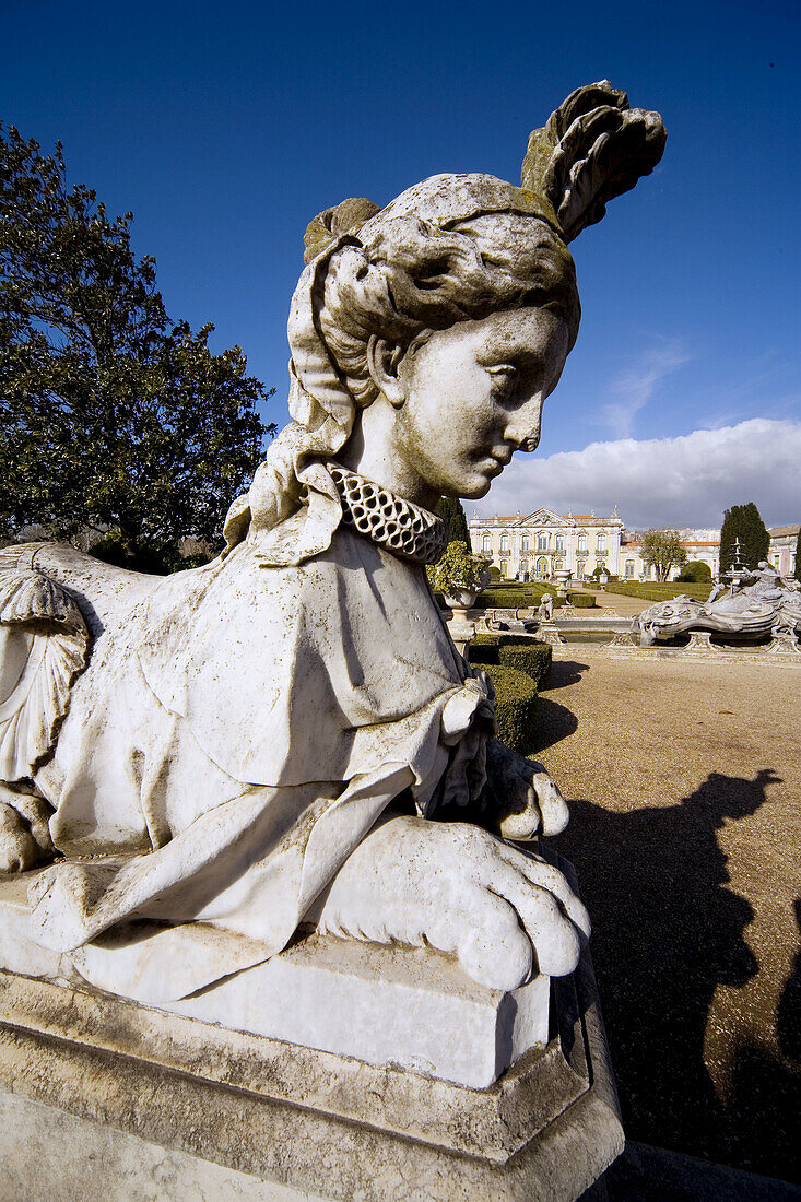Queluz, Portugal: Bizarre mythic statue, half woman and half beast,in the formal gardens of the Palacio Nacional de Queluz. The Queluz Palace, an example of the rococo in Portugal, was constructed between 1747 and 1787...