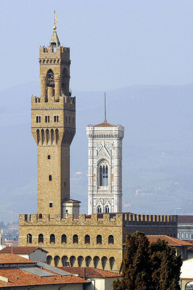Palazzo Vecchio and campanile (bell tower) by Giotto. Florence. Tuscany, Italy