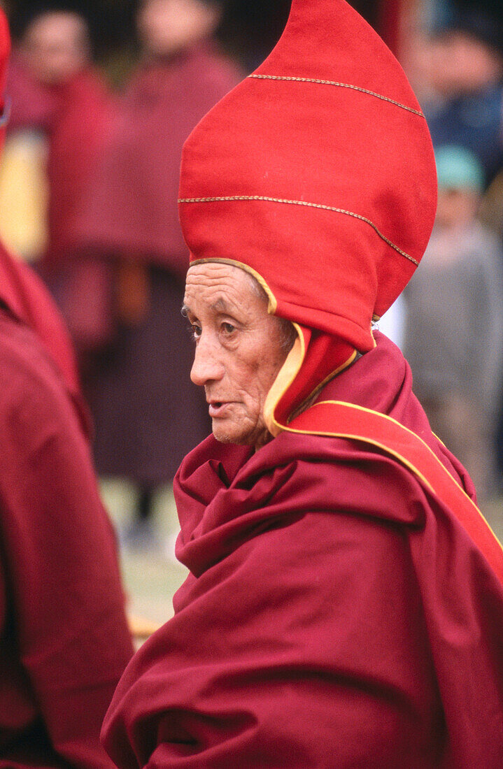 Buddhist monk during Tibetan New Year celebration. Sikkim. India
