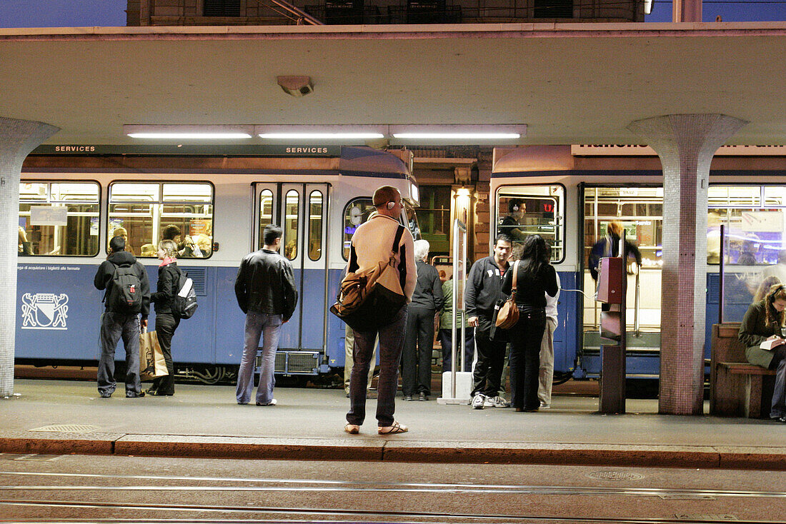 People waiting for tram in Zurich