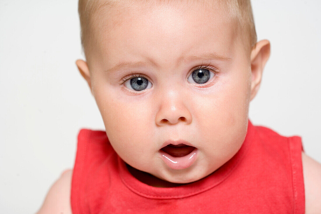  0 to 6 months, 0-6 months, 1 to 6 months, 1-6 months, Angry, Babies, Baby, Bewildered, Bewilderment, Big eyes, Blone, Caucasian, Caucasians, Cheek, Child, Childhood, Children, Close up, Close-up, Closeup, Color, Colour, Concentration, Contemplation, Cont