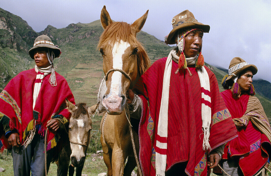 Men with traditional dress. Urubamba River valley, Peru