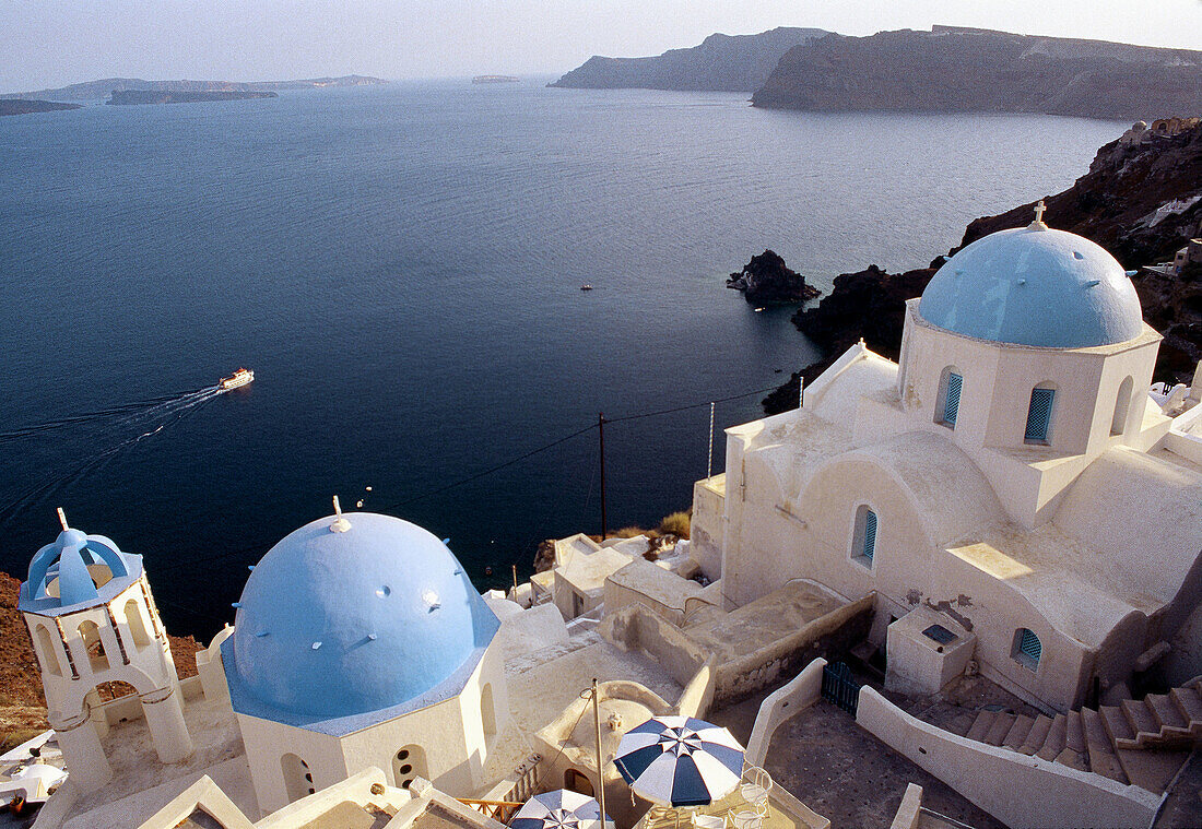 Churches in the village of Oia. Santorini, Cyclades Islands, Greece