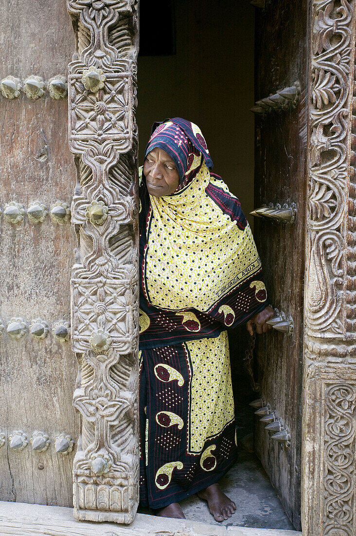 Traditional carved wooden door in Stone Town. Zanzibar Island. Tanzania