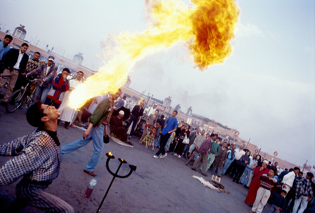 Flame blower at Jemaa el Fna square, Marrakech. Morocco