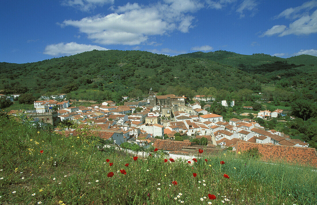 The village of Almonaster La Real in the Sierra de Aracena, which is part of the vast Sierra Morena mountain range; in spring. Province of Huelva, Andalucía, Spain.