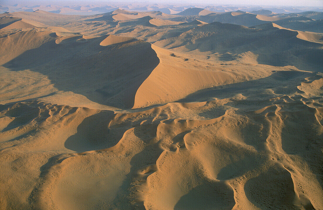 Sand dunes in the Namib Desert; aerial view. Namib-Naukluft Park, Namibia.