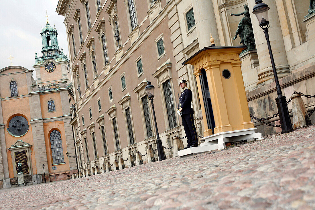 Guard in front of Royal Palace, Slottsbacken, Gamla Stan (Old Town), Stockholm, Sweden