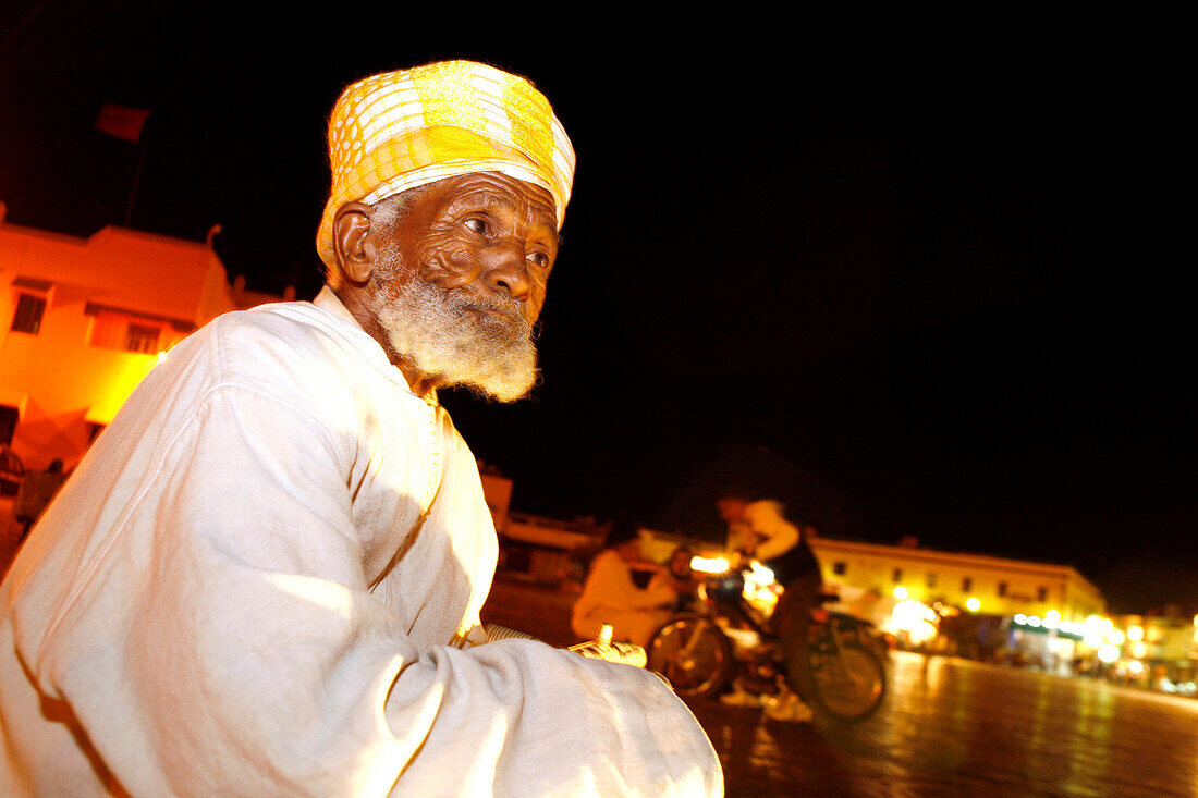 Elder musician in Jemaa El Fna city center, Marrakech, Morocco