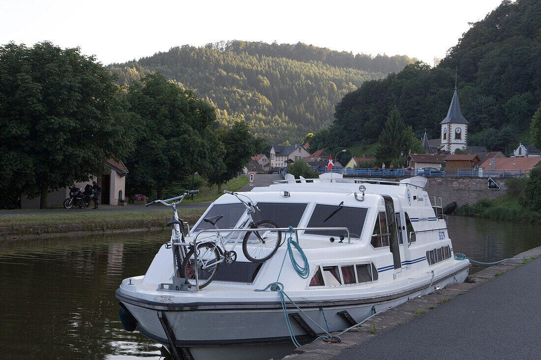 Houseboat Moored on Canal Bank, Crown Blue Line Crusader Houseboat, Canal de la Marne au Rhin, Lutzelbourg, Alsace, France