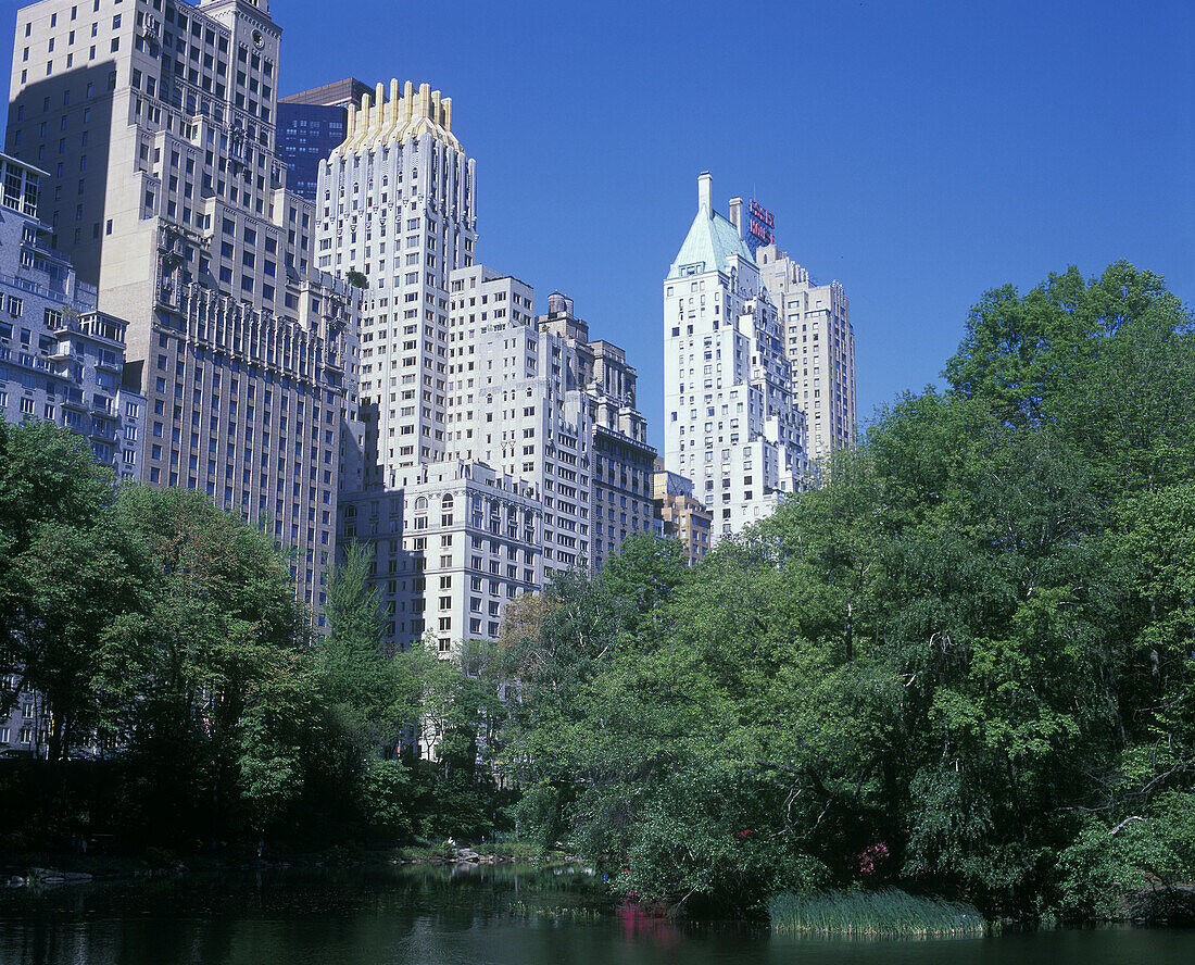 Pond, Central Park south skyline, Manhattan, New York, USA