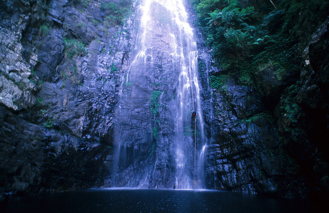 People abseiling over a waterfall in Kanangra Main Canyon, Kanangra Boyd National Park, New South Wales, Australia